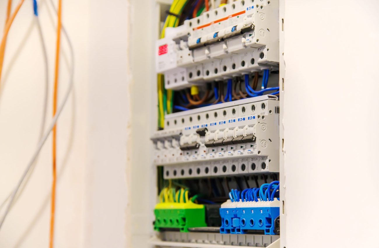 Electric panel in the house. Selective focus. White.